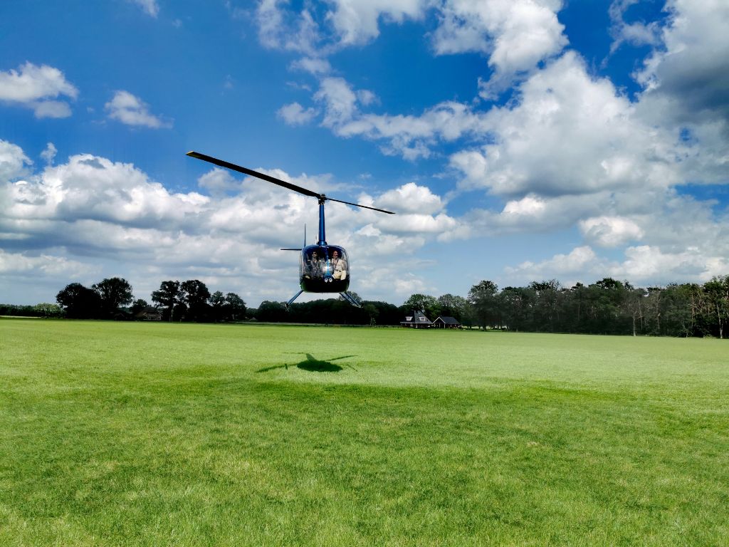 Jubileum dagprogramma In het Veld Groep met helikopter vliegen